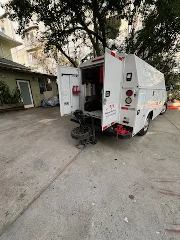 Magnet Plumbing service vehicle on-site for Water Heater Repair in Cocoa Isles Country Club